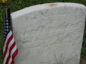Seaman James Forten Dunbar, USN headstone with American flag